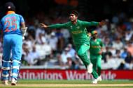 LONDON, ENGLAND - JUNE 18: Mohammad Amir of Pakistan celebrates after taking the wicket of India's Shikhar Dhawan during the ICC Champions Trophy Final match between India and Pakistan at The Kia Oval on June 18, 2017 in London, England. (Photo by Charlie Crowhurst/Getty Images)